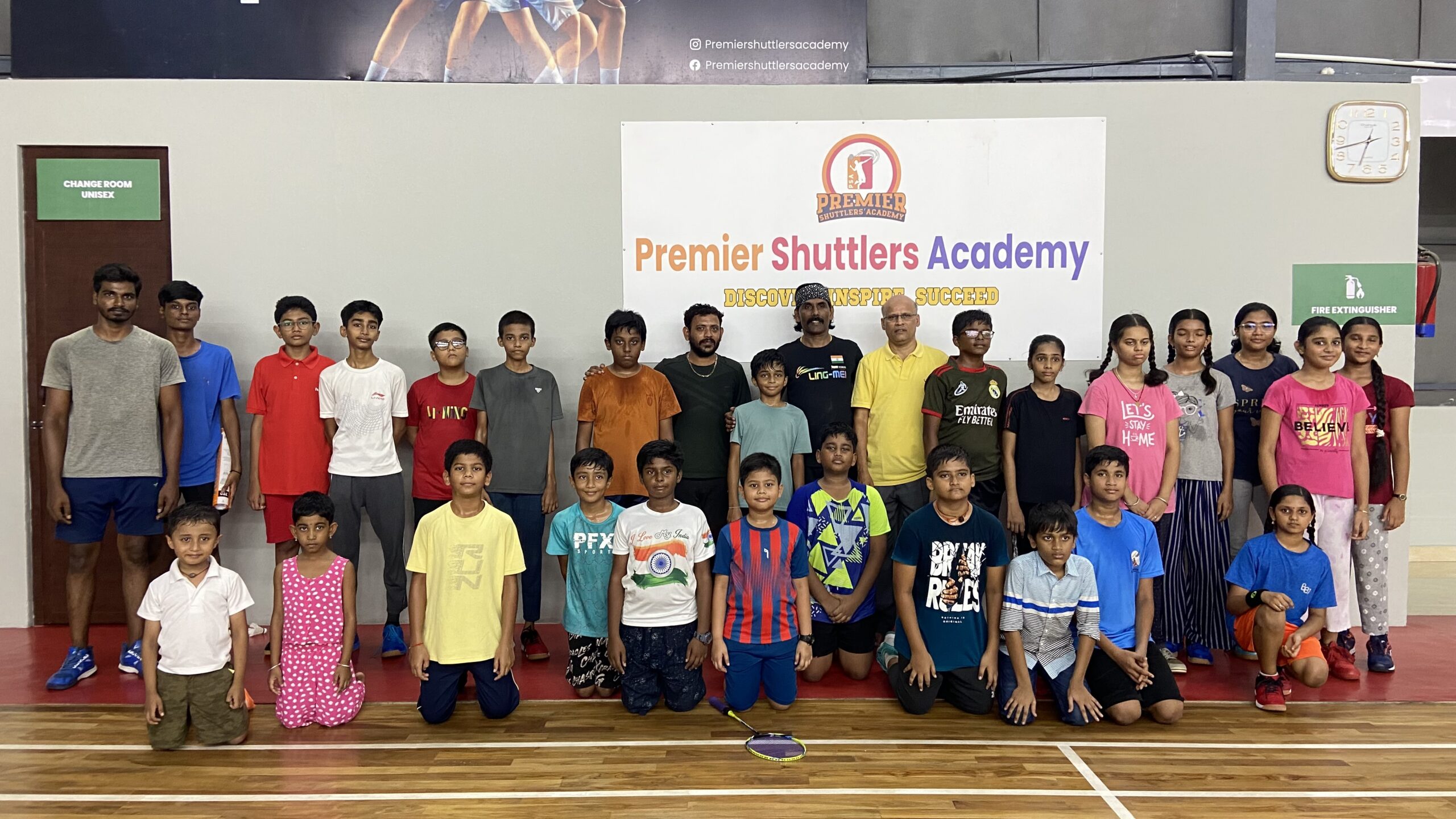 Premier Shuttlers Academy students and coaches group photo — Badminton coaching in Chennai