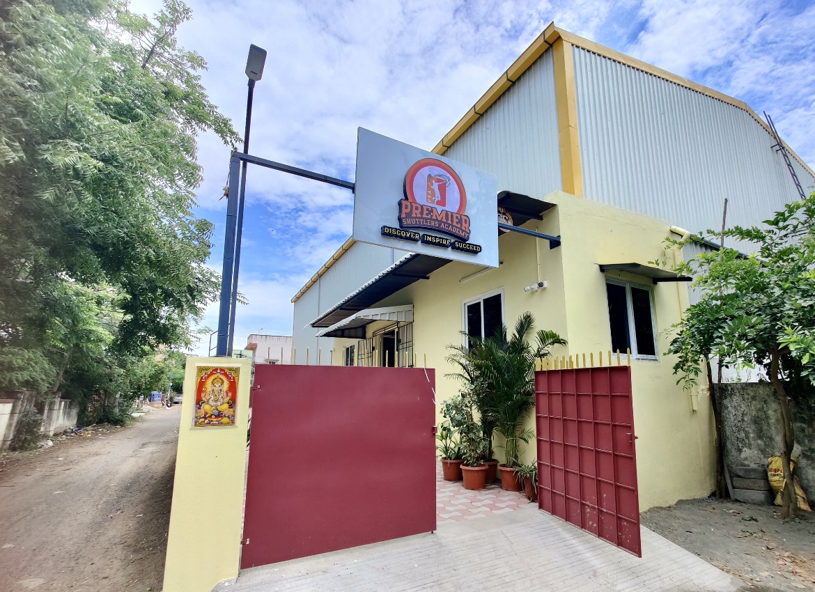 Premier Shuttlers Academy entrance and building in Madambakkam Chennai South